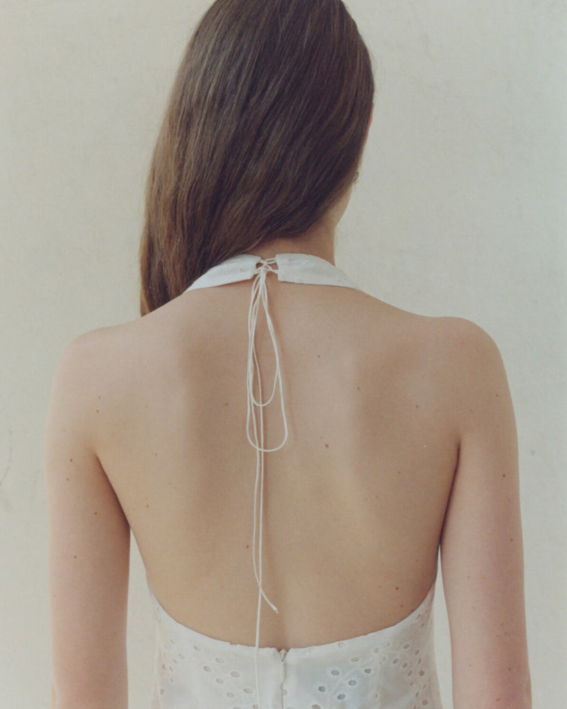 Ivory mini dress with an open back 42 Ivory mini dress with an open back 42