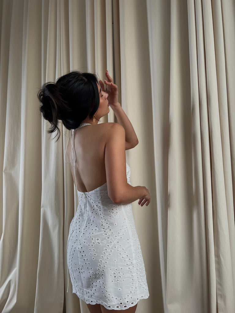 Ivory mini dress with an open back