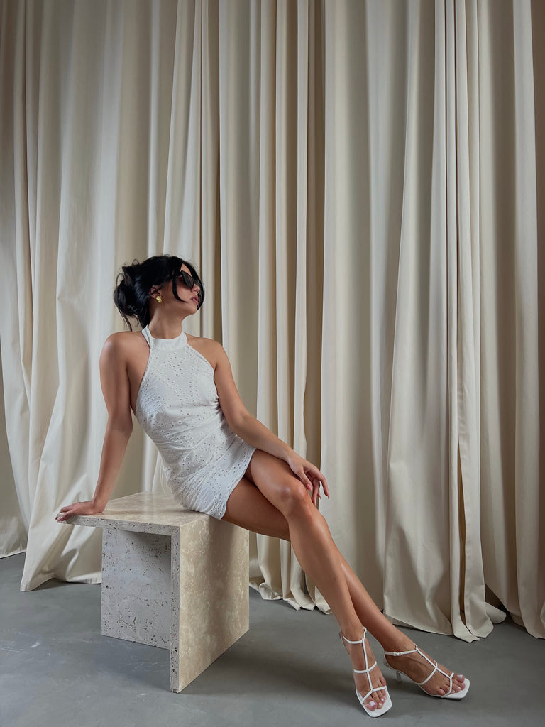 Ivory mini dress with an open back 42 Ivory mini dress with an open back 42