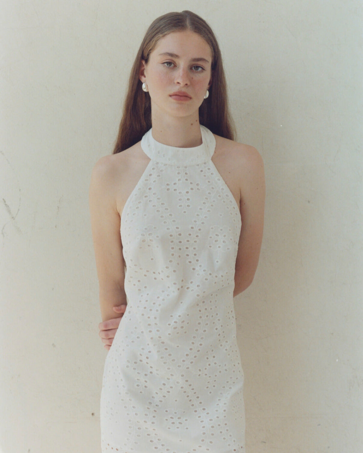 Ivory mini dress with an open back 42 Ivory mini dress with an open back 42
