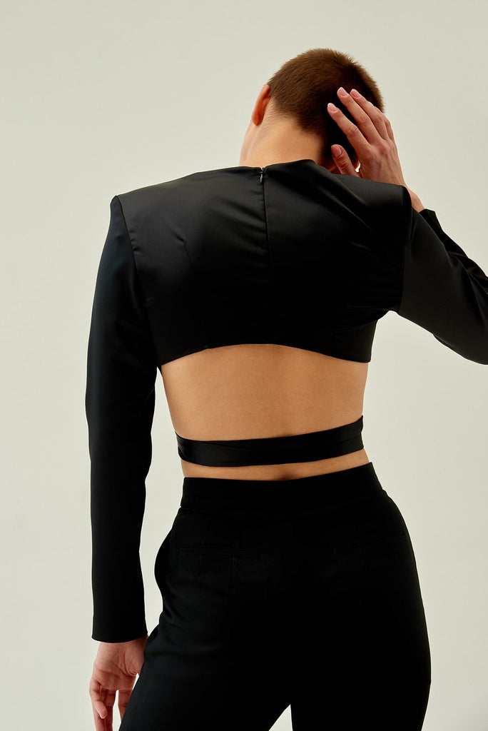 Top with an open back with straps
